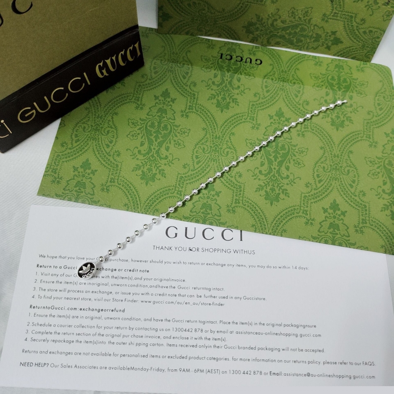 G*u*i bracelets